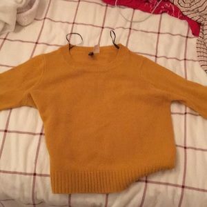 gold sweater